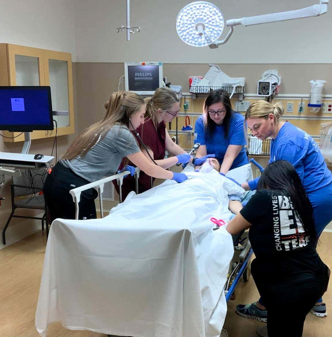 emergency doctors tending to patient